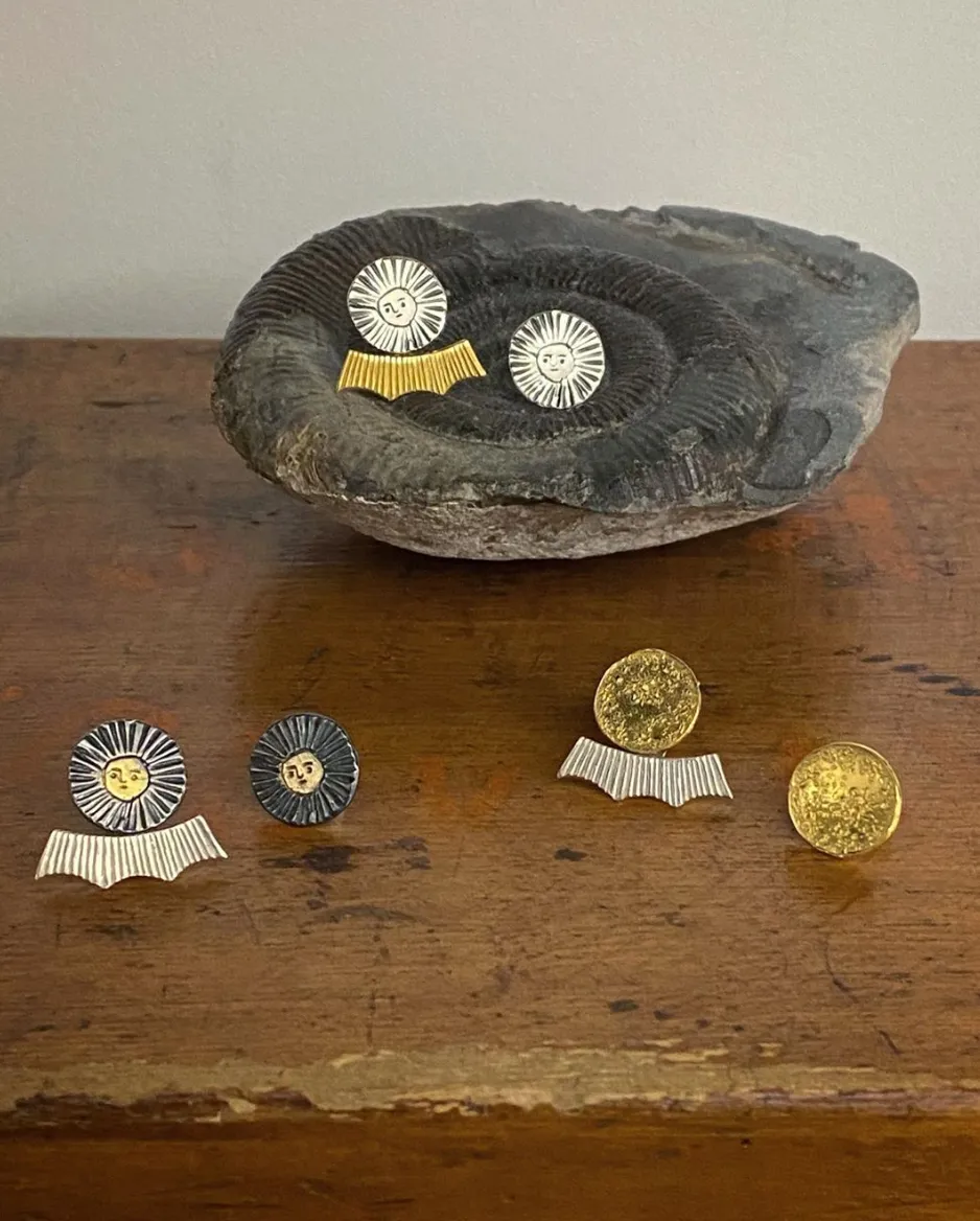 Sun disc earrings silver